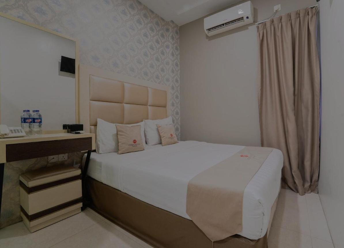 Osaka Hotel Batam Нагоя Экстерьер фото